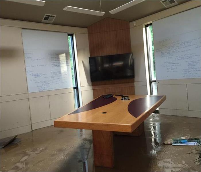 office conference room flooded after storm