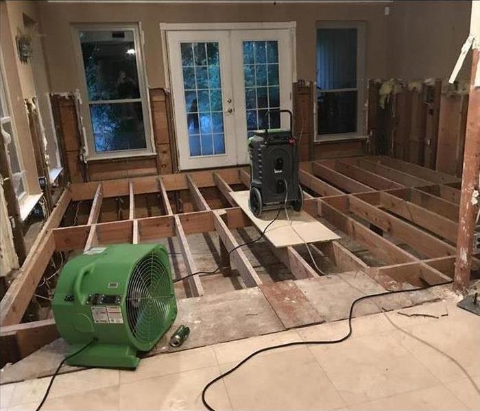 house with interior framing exposed after flood damage from Hurricane Harvey