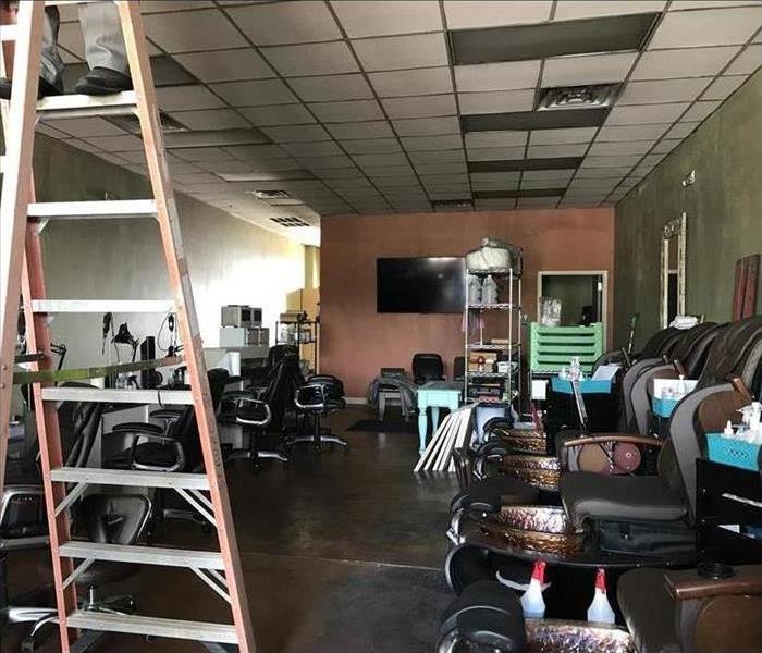 a nail salon is covered by smoke and fire damage