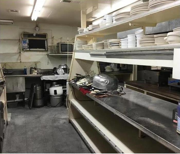 commercial kitchen after fire damage has been cleaned up
